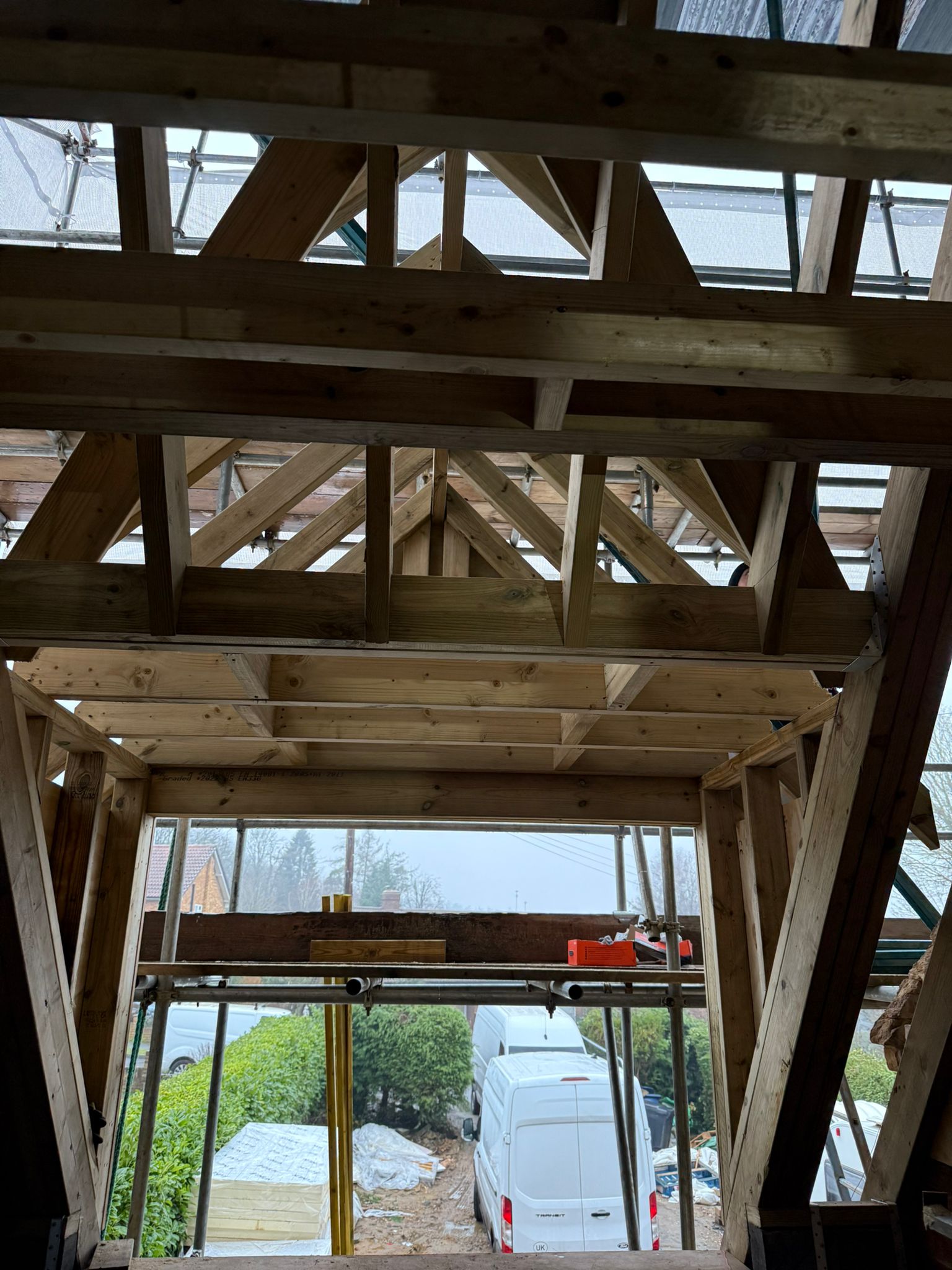 Roof insulation boards between rafters